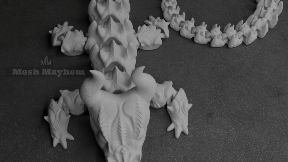 Thumbnail: Articulated Dragon 12: "An articulated dragon design labeled as Dragon 12, available in STL file format."

