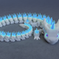 Miniature : Print-in-Place Articulated Unicorn Dragon: "A print-in-place articulated dragon design resembling a unicorn, available in STL file format."

