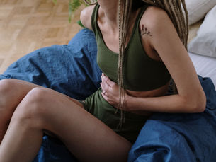 a woman in pain with endometriosis 