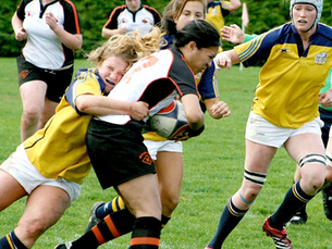women playing rugby