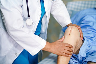 Doctor check Asian senior or elderly old lady woman patient scars surgical total knee join