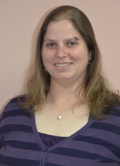 Professional headshot of a smiling female team member.