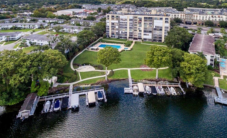 Aerial view of Orlando lakefront apartments with boat docks