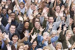 Diverse group of happy people waving