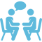 Icon of two people sitting in chairs having a conversation
