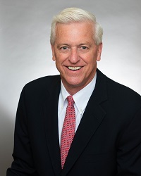 Smiling man in suit and tie