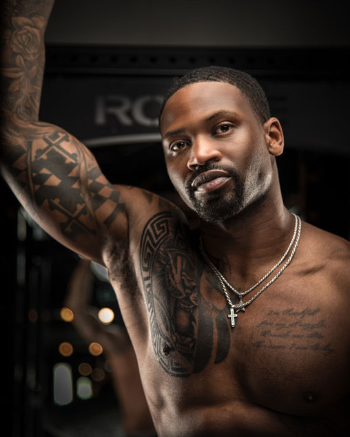 Baltimore fitness entrepreneur portrait in the weight room.