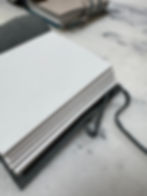 Thumbnail: Handmade paper sheets in a leather case