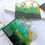 Thumbnail: Emerald green & gold iceberg resin coasters