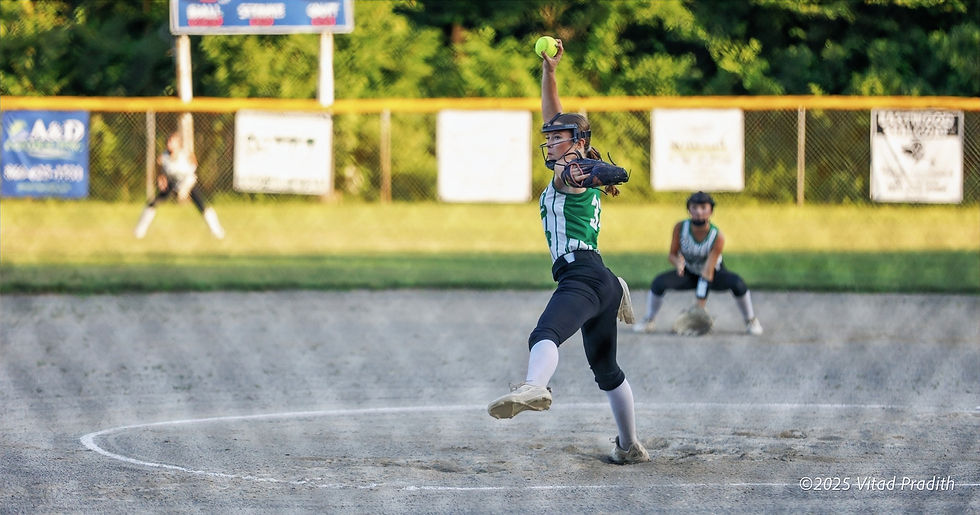 EXPRESS DELIVERY: Guilford pitcher Maeve Eagleson powers ahead and unleashes a fast ball during Sunday's state championship game. Eagleson finished with nine strikeouts and retired the side in each of the last two innings. (Photo courtesy of Vitad Pradith.)