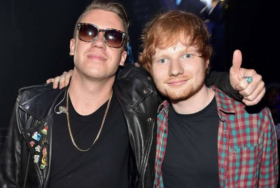 Photo taken from People Magazine, showing Macklemore (left) and Ed Sheeran (right).