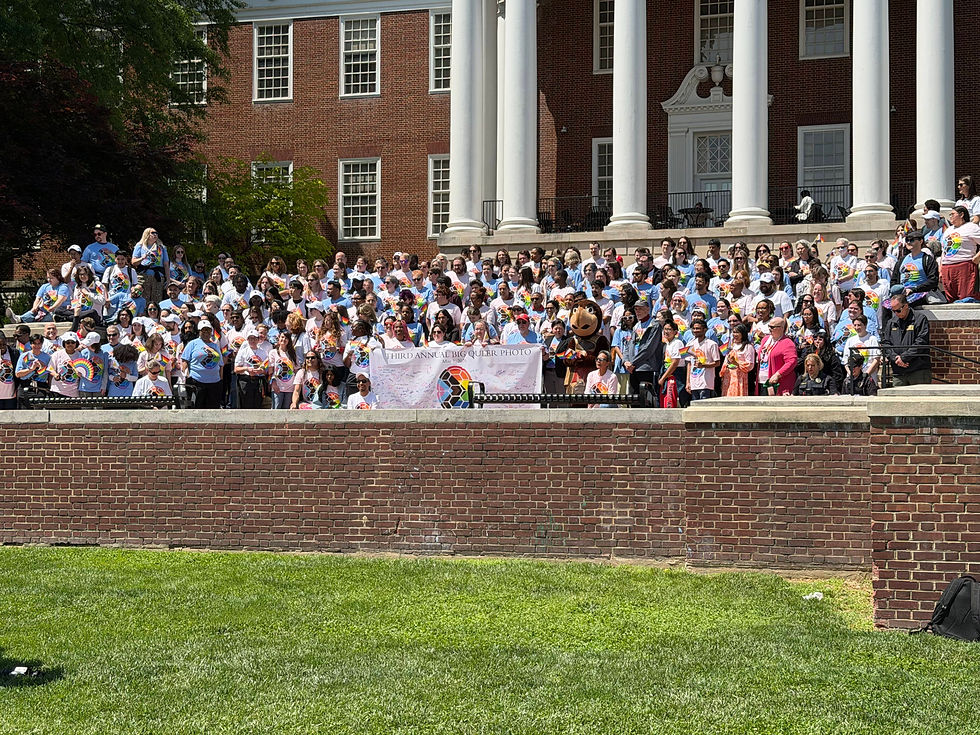 Attendees posing for a photo of the third annual Big Queer Photo Event on Friday, May 1st. (Jose Gonzalez)