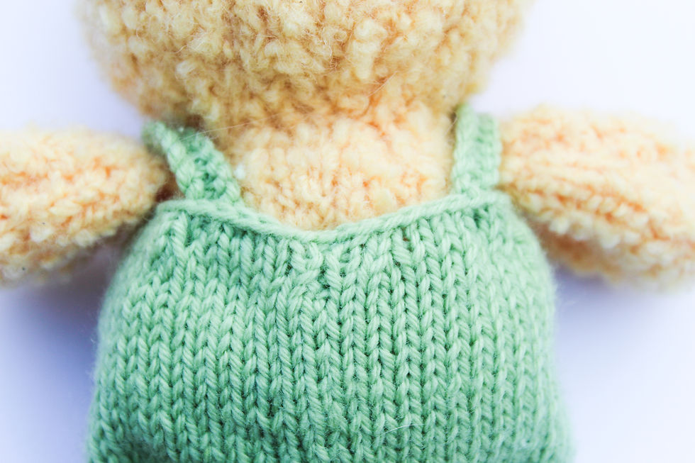 Thumbnail: Darwin Duck wearing dungarees and a flatcap knitting pattern instructions PDF