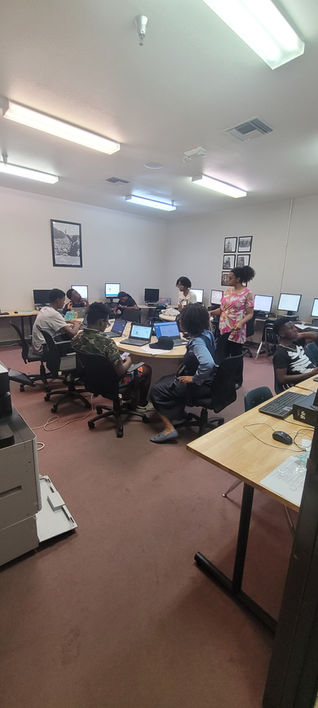 Students working on computers in a classroom