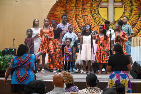 Youth choir singing on stage