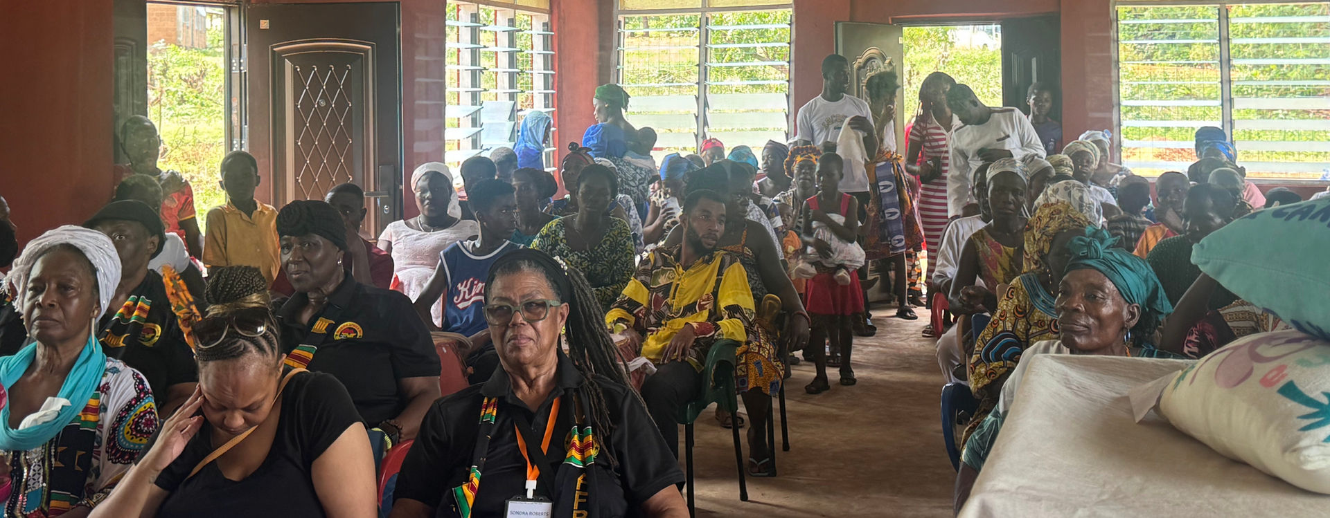 Women gathered in a community hall