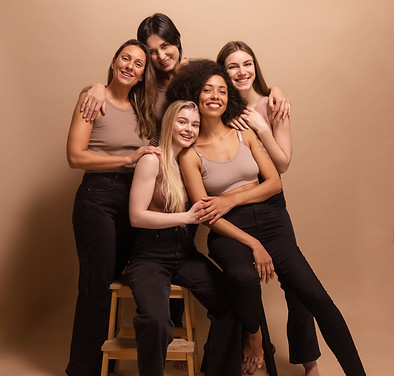 full-length-stylish-diverse-women-caucasian-african-appearance-smiling-camera-beige-backgr