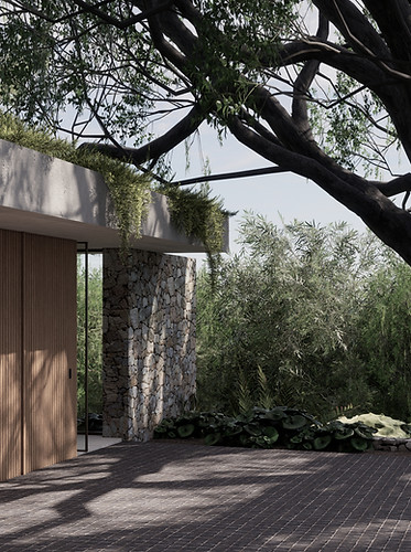 Luxury home entry on the Sunshine Coast featuring vertical timber battens and a raw stone wall.