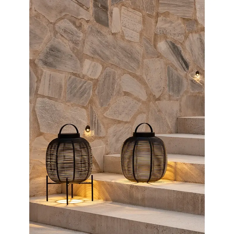 Tika lantern by Vincent Sheppard, design project by ad&MORE. Handcrafted outdoor lighting fixture in a contemporary garden se