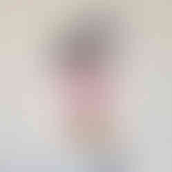 Buttercream icing unicorn birthday cake with rainbow and clouds