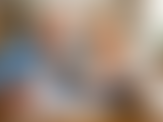 Retired couple discussing buy to let mortgage options