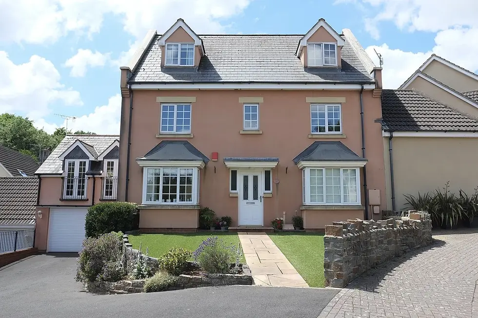 A modern detached UK home, the kind of property a high earner with a low credit score can still mortgage.