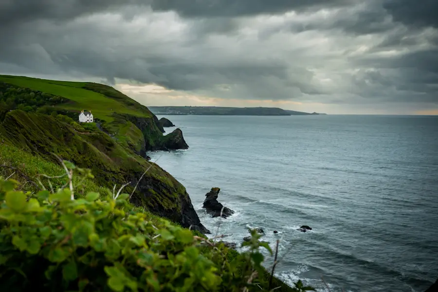 A clifftop house overlooking the sea, the kind of home financed with a coastal property mortgage.