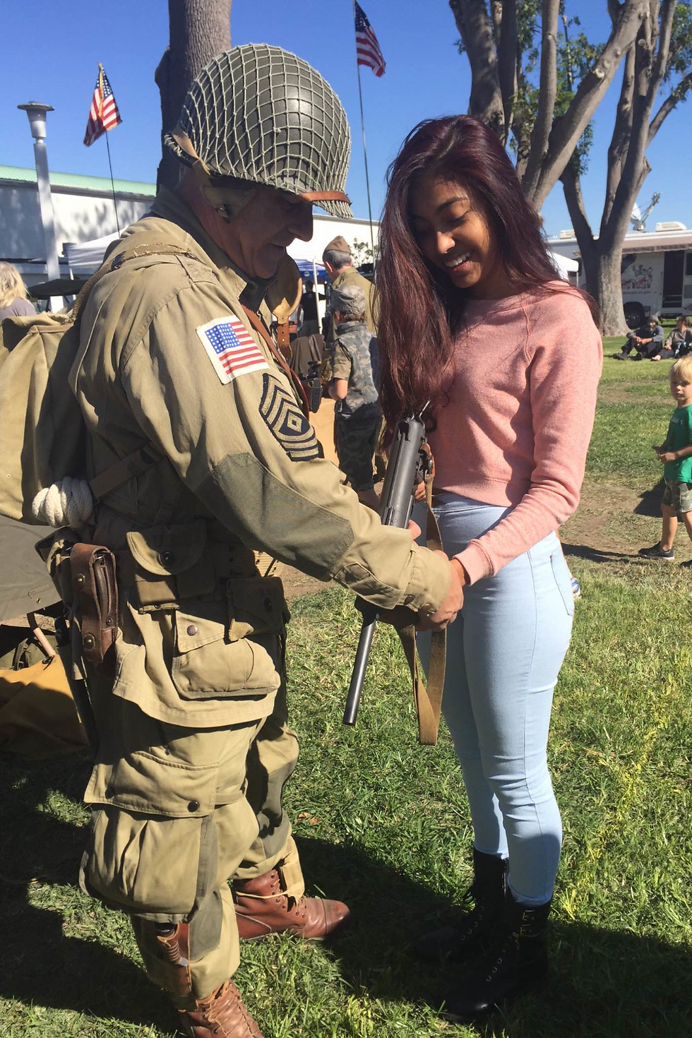World War II Veteran showing one of the many guns used during World War II. Photo taken by Malaine Ribeiro.