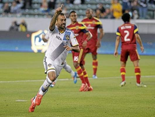 L.A. Galaxy's Juninho flashes a winning smile after scoring the penalty kick. (AP/Jae C. Hong)