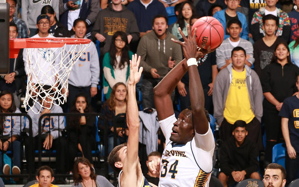 Mamadou Ndiaye rises and slams on the UCSD Tritons.