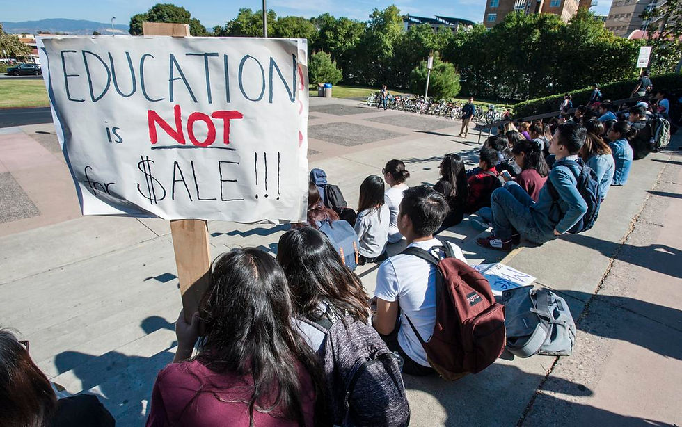 UCI Students gather around steps near Aldrich Hall before protest begins