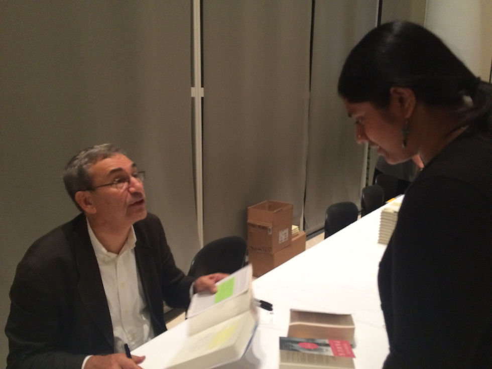 Orhan Pamuk fan, Janani Venkateswaran, has her copy of A Strangeness in My Mind signed by the author at his Getty 360 Lecture, "The Art of Writing"