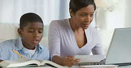 black mom homeschooling teenage son.jpeg