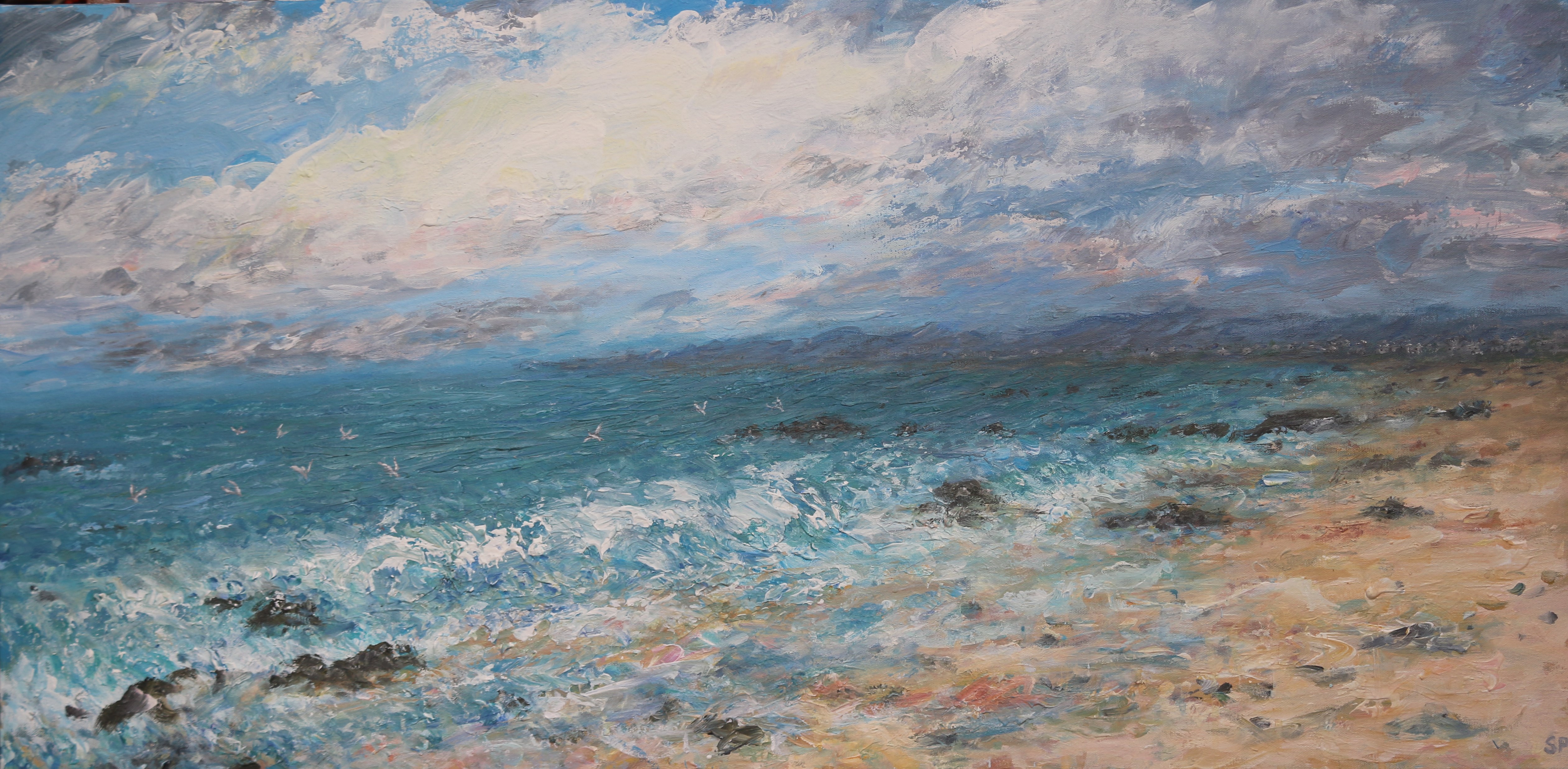 Rhosneigr with clearing skies and gulls