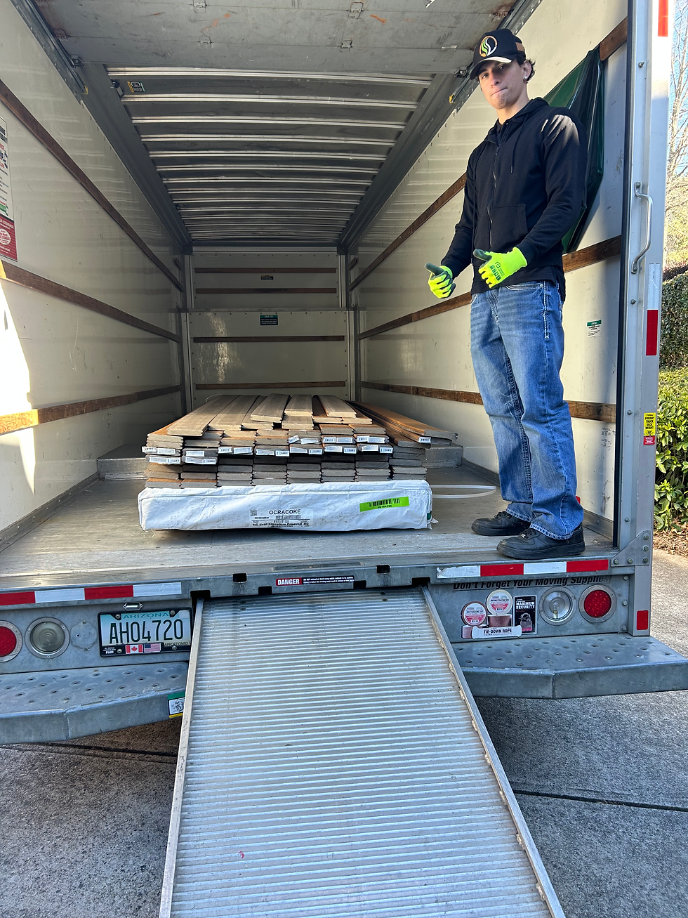 Picking up a bed and frame for moving.