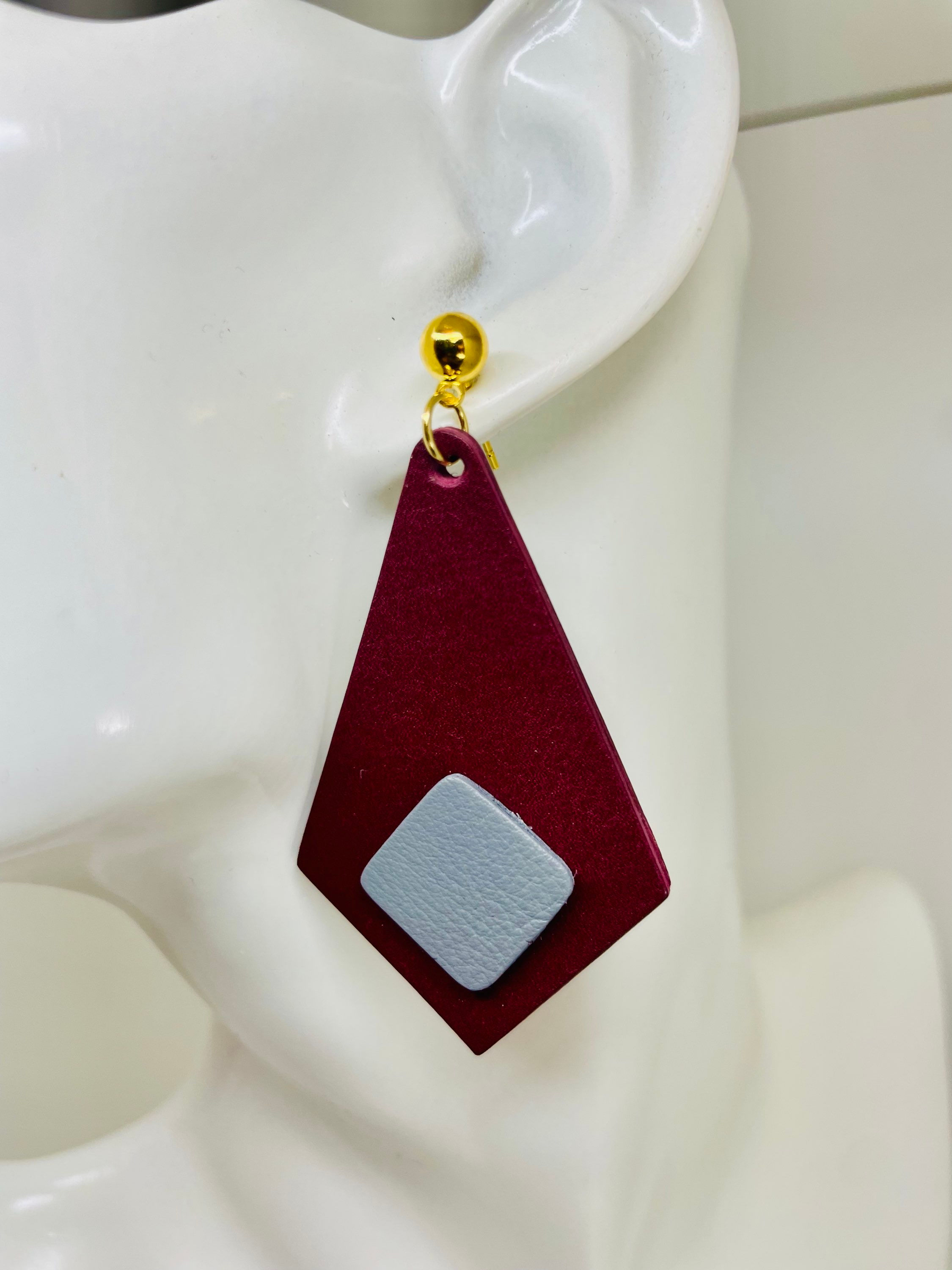 Burgundy and light gray leather earring