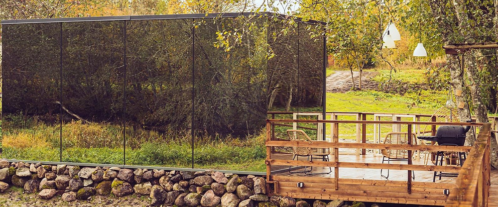 Outdoor mirror with decking in foreground