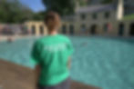 A woman wear's a T-shirt saying Cleveland Pools is 'Britain's oldest lido'