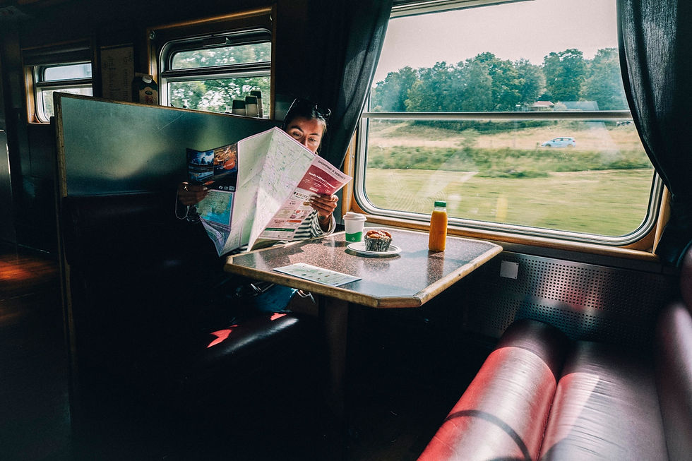 woman with map on a train