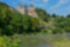 fortified village with river in foreground