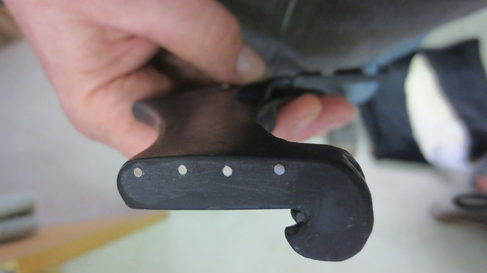 Broken hook on bridge is repaired with four steel pins