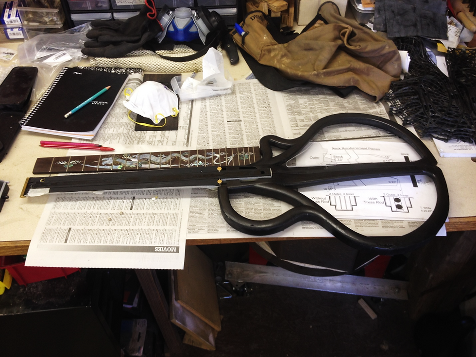 Ridgewing #1 frames fresh out of the mold shown with neck, fret board and headstock