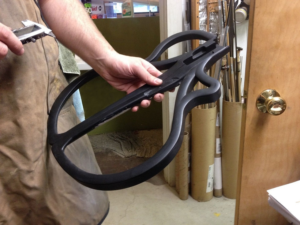 Just a last little dab of Bondo on a carbon-fiber frame to sand out and paint when it hardens