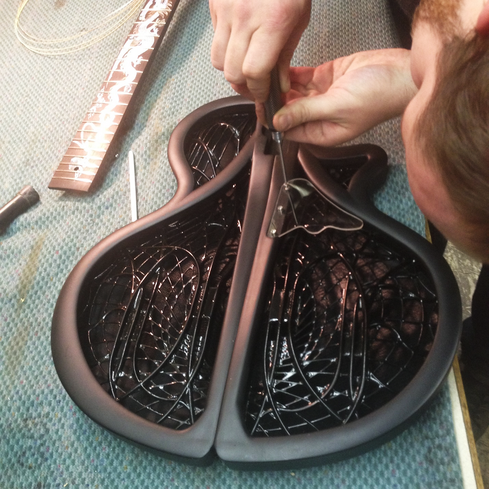 Tightening the last of thirty-five screws that hold the Ridgewing body together