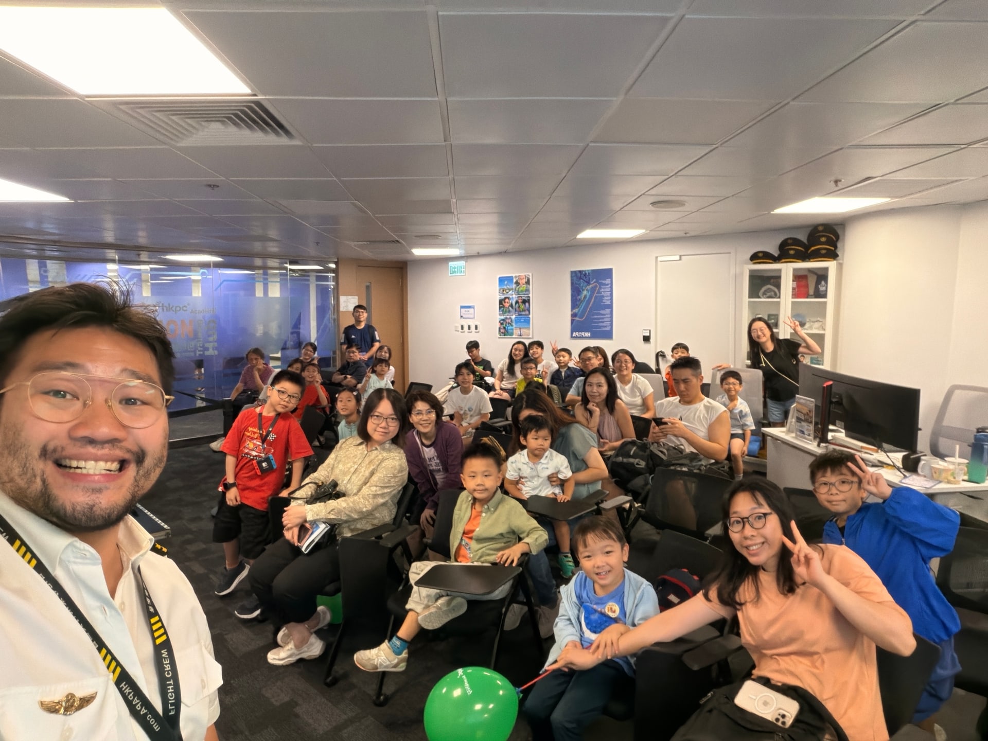 Another group of children and parents completes its HKPAPA aviation experience.