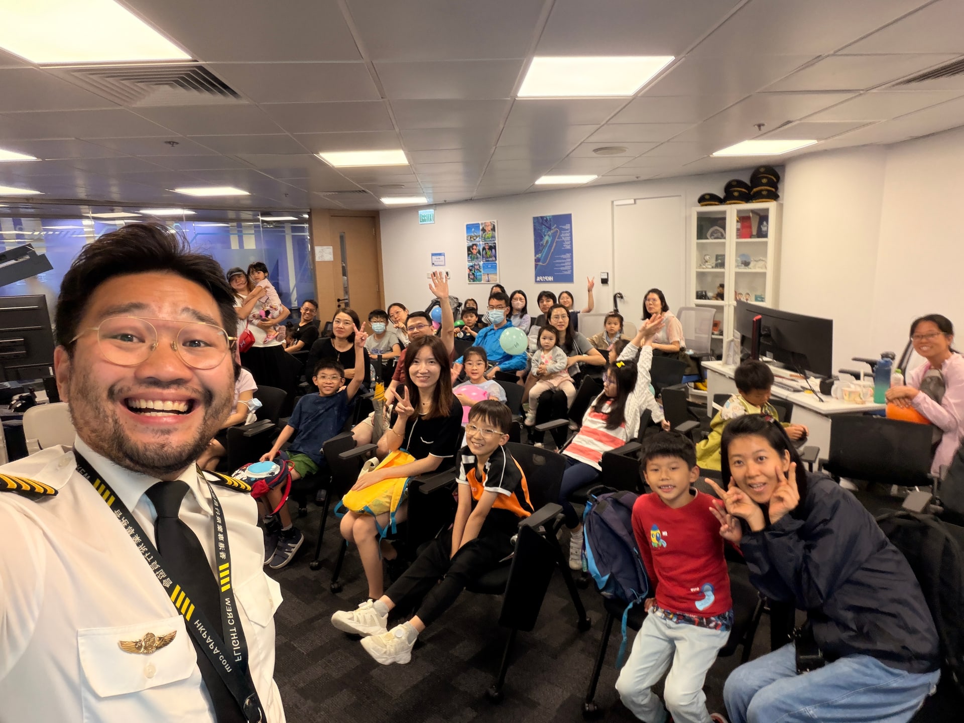 Young participants and families gather with an HKPAPA pilot at Summer TechEd Fest 2026.