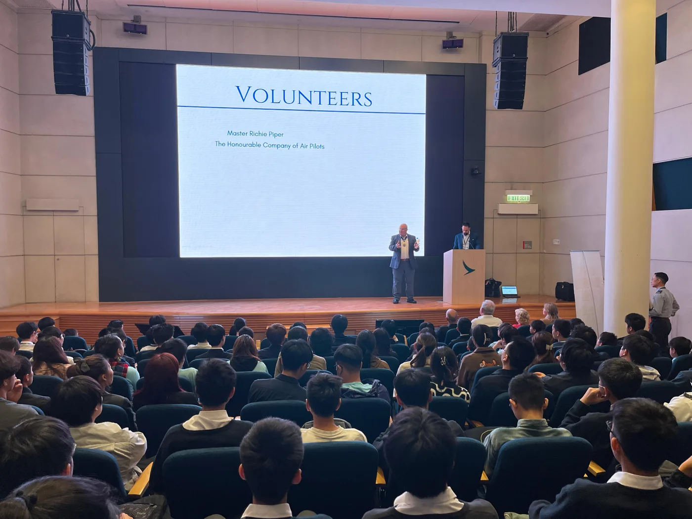 Young participants attending an aviation talk