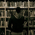 person wearing black and gray jacket in