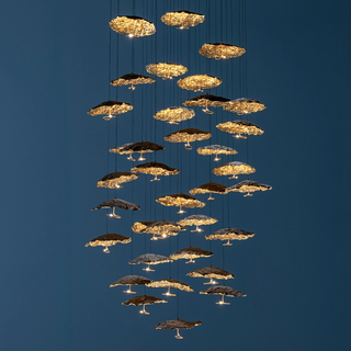 Gold chandelier with small LED lights different heights