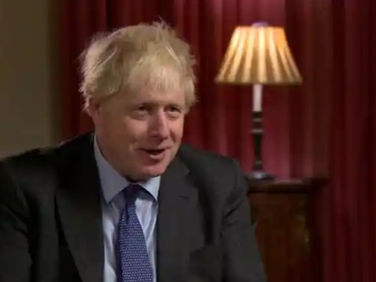 British PM warns of new year lockdown if rules not observed